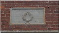 Plaque on the Kirby Cane Memorial Hall