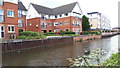 Modern housing beside the Loughborough canal branch