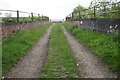 SK8138 : Farm track from Grantham Road over railway by Roger Templeman