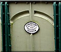 Late Victorian plaque on the side of a bridge opposite platform 1, Pontypridd railway station