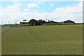NZ3824 : Arable field beside Whitton Three Gates by Graham Robson