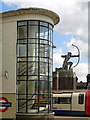 East Finchley tube station - spiral staircase and the "Archer" sculpture