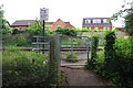 Kissing gate at entrance to pedestrian level crossing, St. John