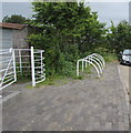 White cycle racks and kissing gate at the edge of Bute Town near Rhymney