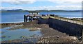 NM8540 : The old pier at Achnacroish by Gordon Brown