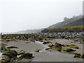 SY3492 : Beach east of Lyme Regis by Robin Webster