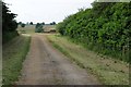 SP6568 : Farmland access track by Philip Halling