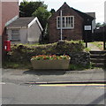 Queen Elizabeth II postbox alongside the B4459 in Pencader