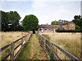 TQ0787 : Footpath passing Dunster Cottage by James Emmans