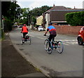ST3093 : Two tricyclists, Newport Road, Llantarnam by Jaggery