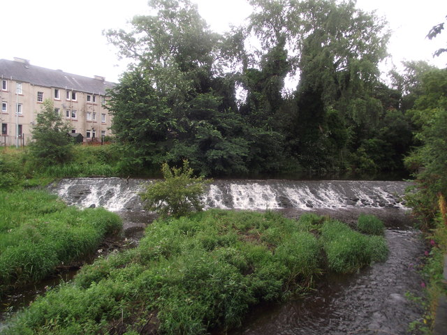 Water of Leith flows over a weir
