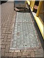 Pavement light on the High Street, Bangor