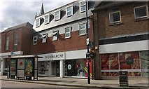 TL1860 : Shops on Church Street, St Neots by David Howard