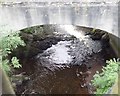 The Creggan River flowing beneath the Newry Road bridge at Creggan village