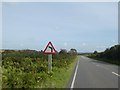 SX2285 : Warning sign for a bend ahead on A395 by David Smith