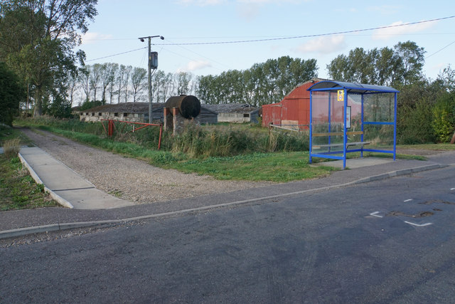 Bus stop and poultry sheds at Ten Mile Bank