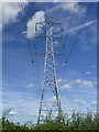 SK7664 : Electricity pylon under a blue sky by Graham Hogg