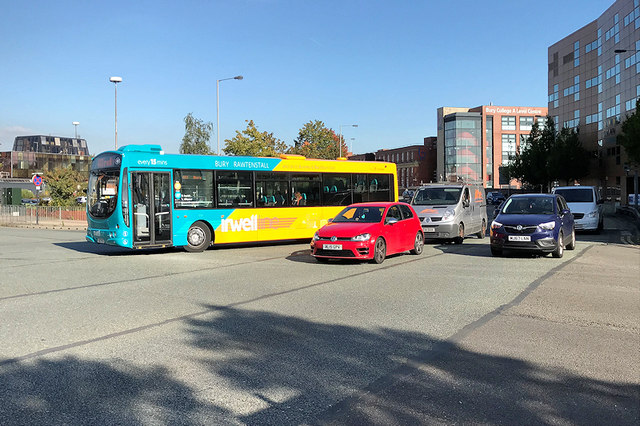 Rosso Bus turning into Haymarket Street