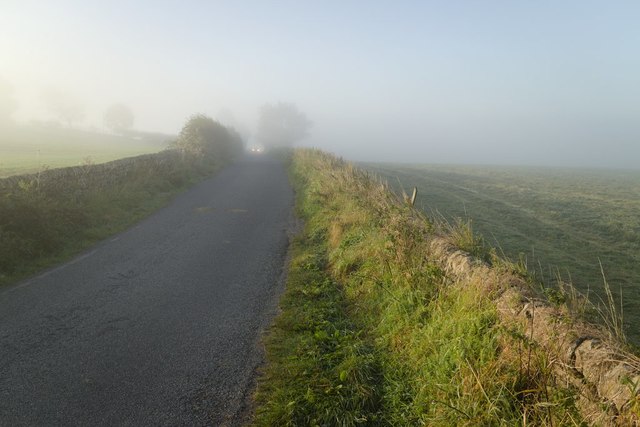 Mist and an approaching car, Merrybank Lane