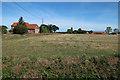 TG3331 : Stubble field by Manor Farm by Hugh Venables