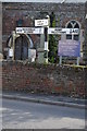 TF5372 : Hogsthorpe (A52), High Street. Fingerpost by Andrew Riley