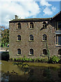 SJ9689 : Converted canalside warehouse by Marple Locks, Stockport by Roger  Kidd