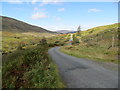 NN0967 : Minor road proceeding down the valley of the River Kiachnish by Peter Wood