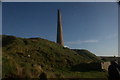 View of the chimney of one of the Botallack mines on the clifftop