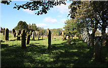 NX7869 : Kirkpatrick Durham Church Graveyard by Billy McCrorie