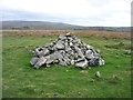 SX5465 : Summit cairn on Wigford Down by David Purchase