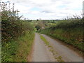 H8921 : Forge Road descending towards the junction with Bog Road by Eric Jones