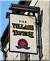 Sign for the Village Tavern