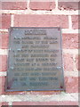 Plaque on post office wall, Holywell