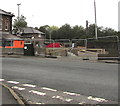 Dark green cabinet and temporary fencing, Station Road, Cwmbran