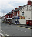 Row of shops on the south side of the A549 Chester Road, Buckley