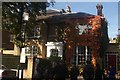 View of a house covered in autumn leaves on Bedford Gardens