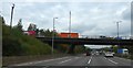SO9998 : A454 bridge over M6 at junction 10 by David Smith