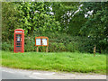 Phone box, notice board, pump, Chignall St James