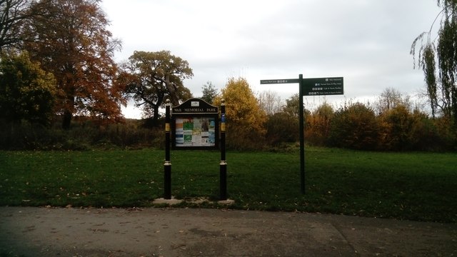 Noticeboard and signpost, War Memorial Park