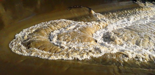 The River Avon in Spate at Pulteney Weir - Bath
