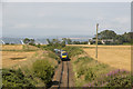 Train travelling north on single track rail at Usan