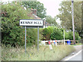 TL6680 : Kenny Hill Village Name sign by Geographer