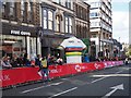 Cameraman waits on Parliament Street in Harrogate