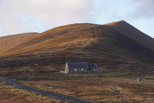 The Foula chapel and Hamnafield from the airstrip, Foula