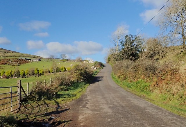 Drumaquoile Road ascending to its... © Eric Jones :: Geograph Ireland