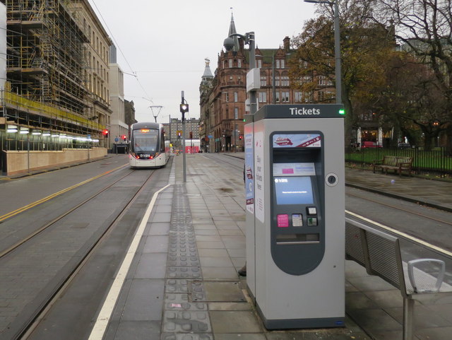 The Edinburgh tram departs St Andrew Square
