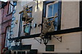 Oswestry: sculptures on the Griffin pub, Albion Hill