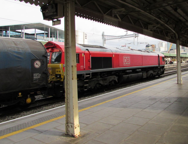 Diesel locomotive travelling west through Cardiff Central station