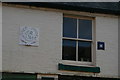 Plaque and sign on a shop, Beatrice Street, Oswestry