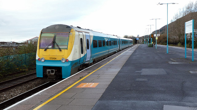 A Transport for Wales service departing from Port Talbot Parkway